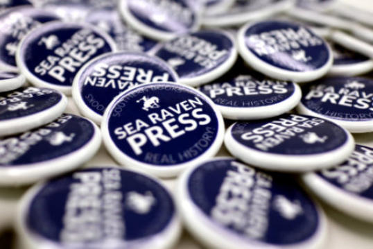 alt="Sea Raven Press lapel pins available on our Webstore"